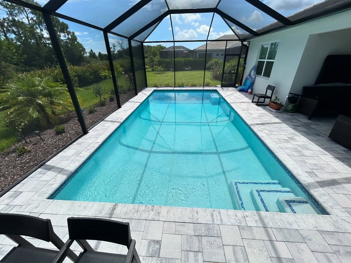 Screened Pool with Tropical Landscaping - Bonita Springs